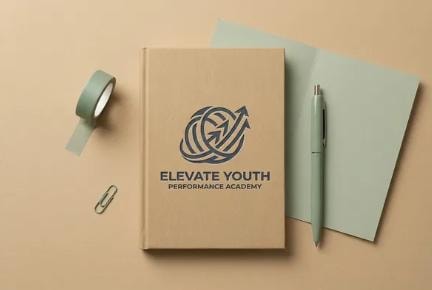 Elevate Youth — branded notebook and stationery, concept mockup
