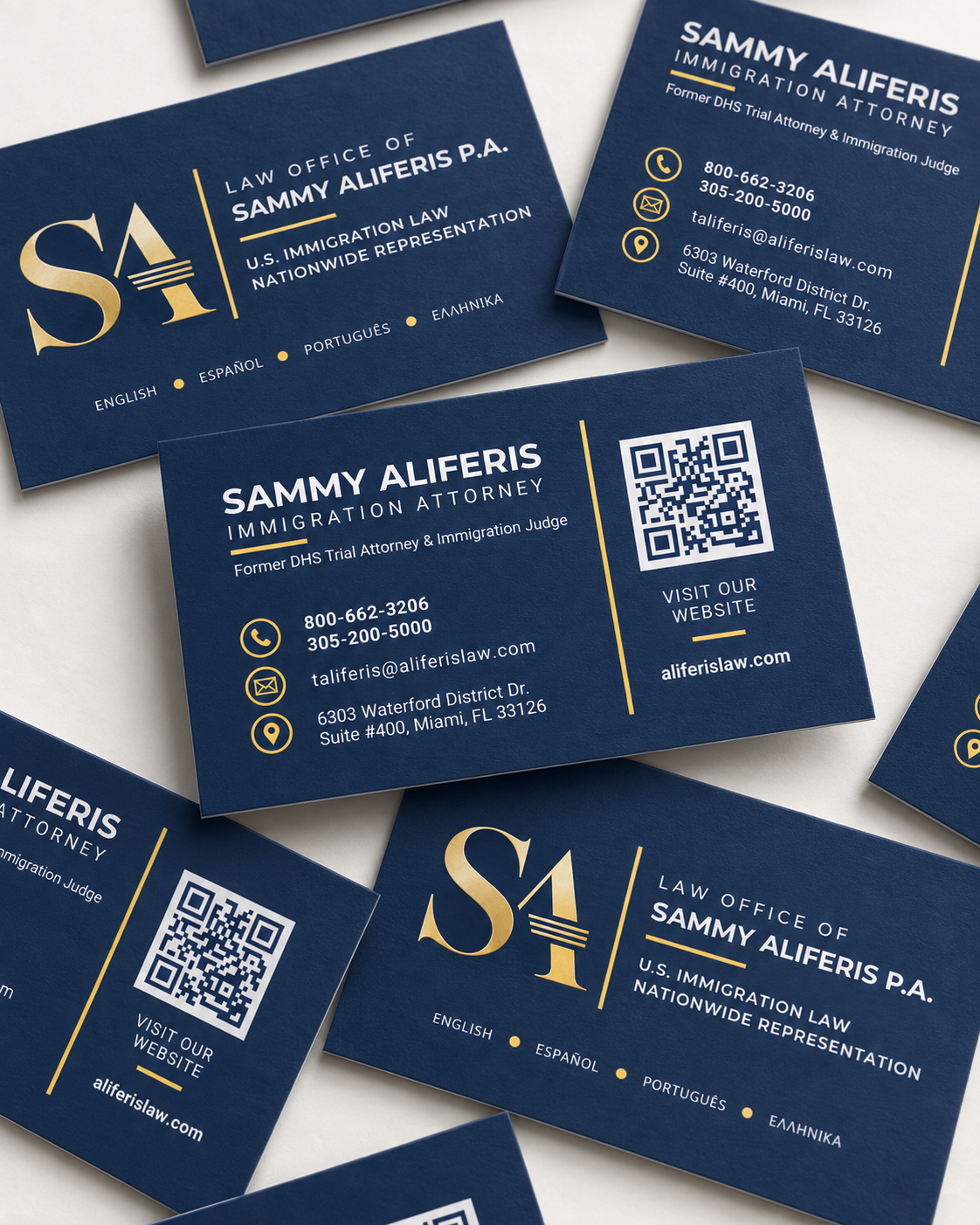 Sammy Aliferis business cards — front and back faces scattered on a light surface